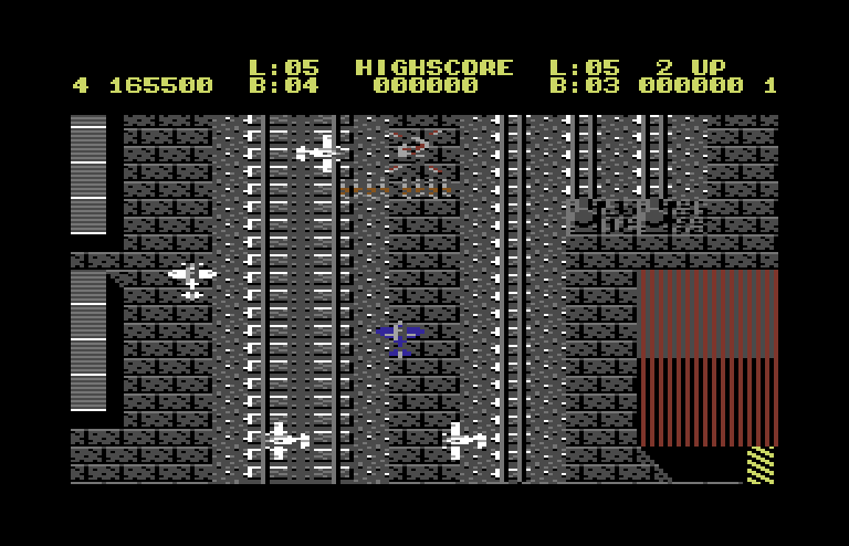 Sky Shark Commodore 64 Screenshot: Destroy all of the white planes for a bonus. 