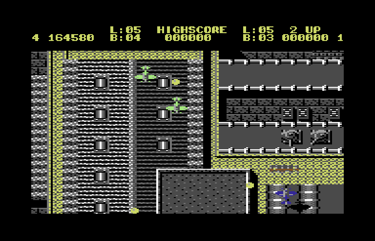 Sky Shark Commodore 64 Screenshot: Attempting to destroy some tanks...