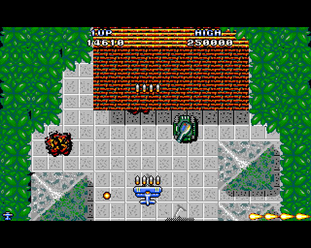 Sky Shark Amiga Screenshot: Tanks and other vehicles can hide in buildings like this one.
