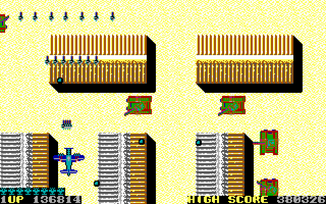 Sky Shark IBM PC/Compatibles Screenshot: Here comes a line of tanks...