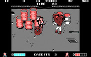 Double Dragon for IBM PC/Compatibles - This end of level boss throws barrels at you...