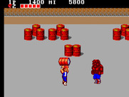 Double Dragon for Sega Master System - Pick up barrels to throw at opponents...