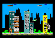 Rampage for TRS-80 Color Computer - Smash the taxi for bonus points...