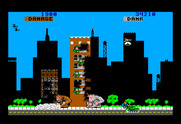 Rampage for TRS-80 Color Computer - A building crumbles...