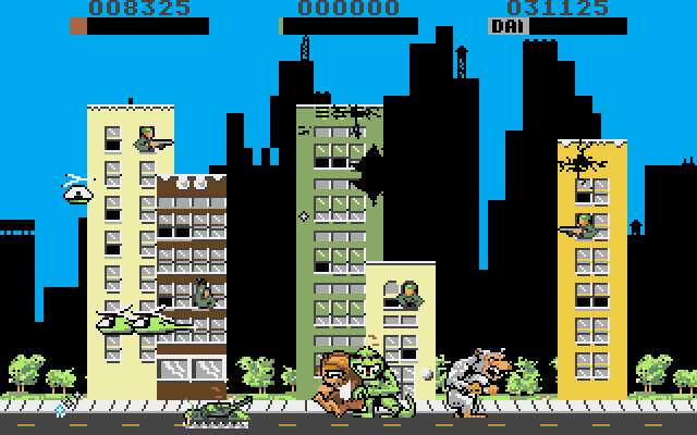 Rampage Amiga Screenshot: Those tanks cause a lot of damage!