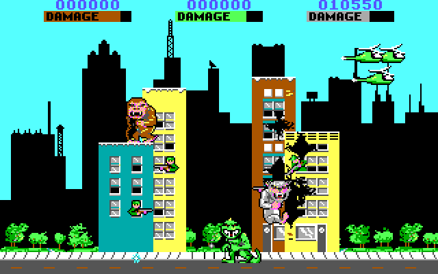 Rampage IBM PC/Compatibles Screenshot: Destroying some buildings...