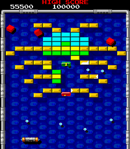 Arkanoid 2: Revenge of DOH Arcade Screenshot: Catch the red capsule for lasers!