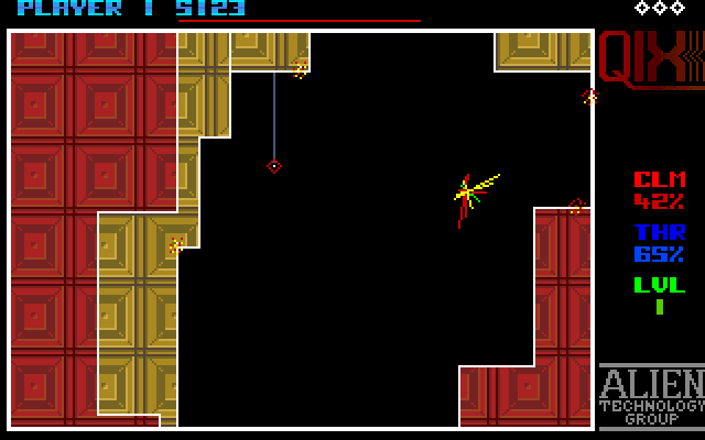 Qix Amiga Screenshot: Drawing a line...don't let the Qix catch you!