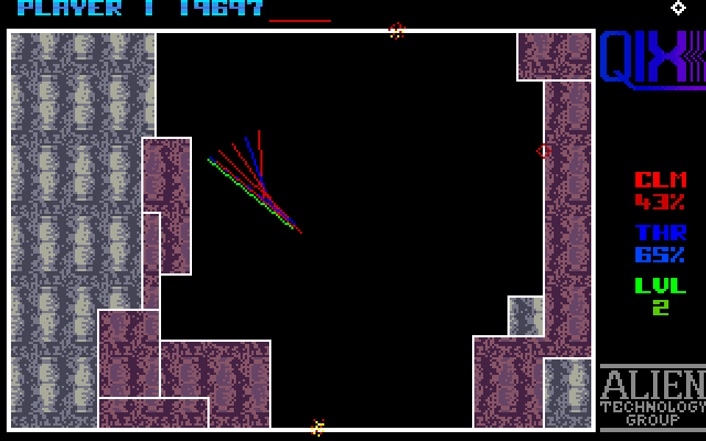 Qix Amiga Screenshot: Don't run into the Sparx patrolling the borders.