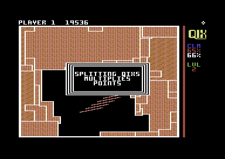 Qix Commodore 64 Screenshot: Starting on the next level splitting two Qix multiplies points.
