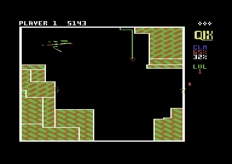 Qix Commodore 64 Screenshot: Drawing...don't get caught by the Qix!