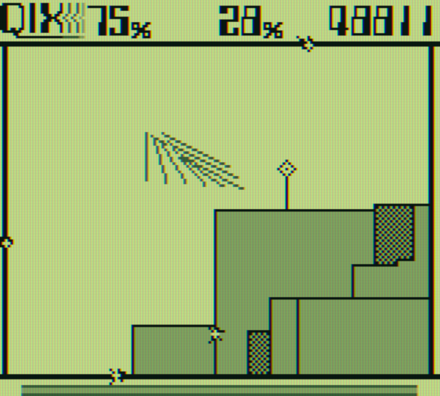 Qix Game Boy Screenshot: There are now four sparx patrolling the borders...