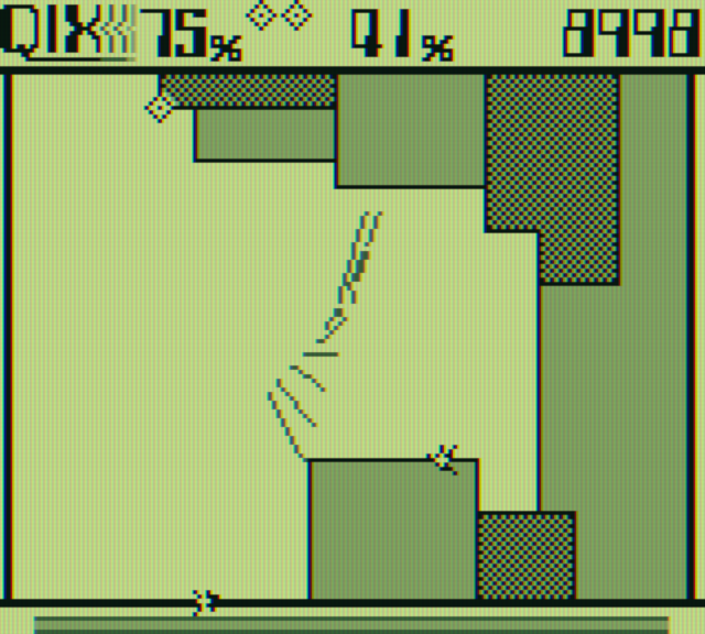 Qix Game Boy Screenshot: Slowly claiming territory...