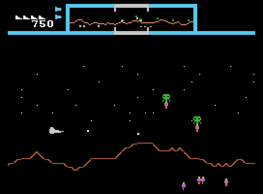 Defender ColecoVision Screenshot: Save humans that have been captured...