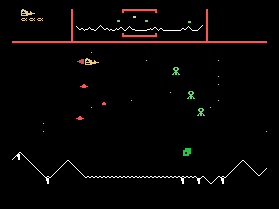 Defender TI-99/4A Screenshot: Starting on attack wave 2 there are more types of enemies to deal with...