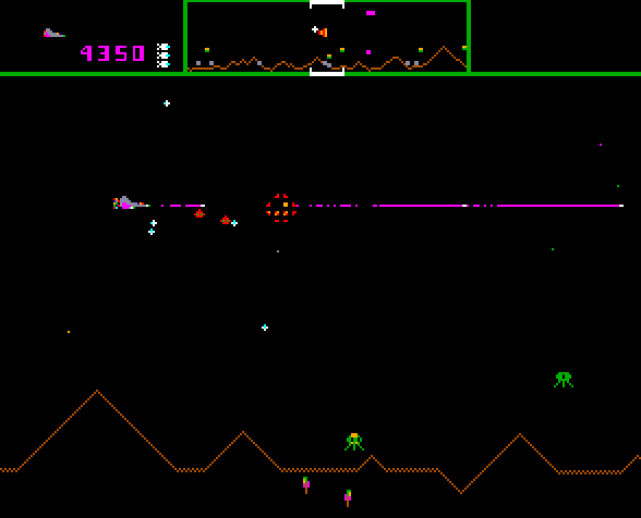Defender Arcade Screenshot: When you shoot a pod it splits into multiple swarmers.