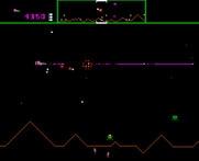 Defender for Arcade - When you shoot a pod it splits into multiple swarmers.