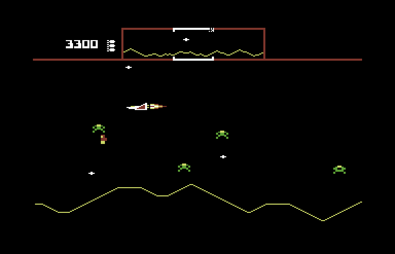 Defender Commodore 64 Screenshot: Attempting to rescue a captured humanoid.