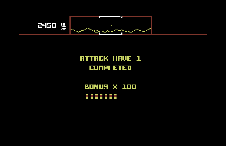 Defender Commodore 64 Screenshot: Attack wave 1 completed.