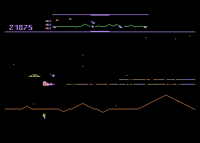 Defender Atari 8-bit Screenshot: That ship sneaking up from behind is particularly quick!