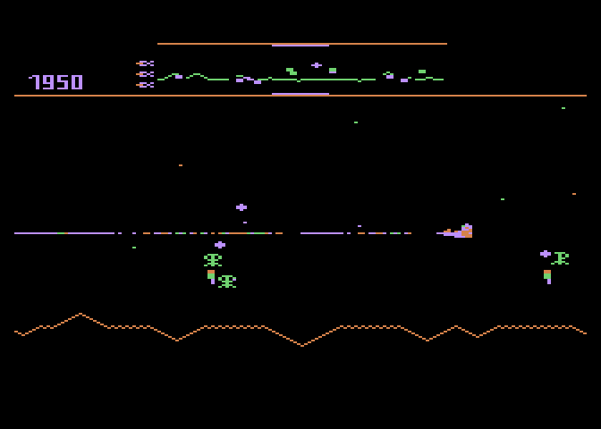 Defender Atari 8-bit Screenshot: Your ship can fly towards the left or right...