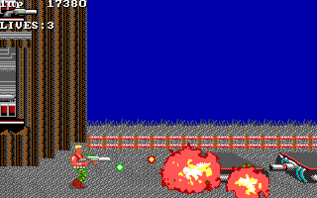 Super Contra IBM PC/Compatibles Screenshot: Destroy these flat mini-tanks.