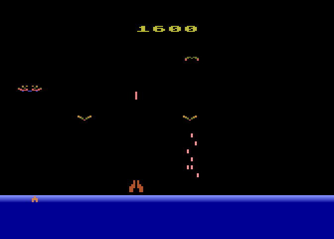 Demon Attack Atari 8-bit Screenshot: The smaller demons are more difficult to hit...
