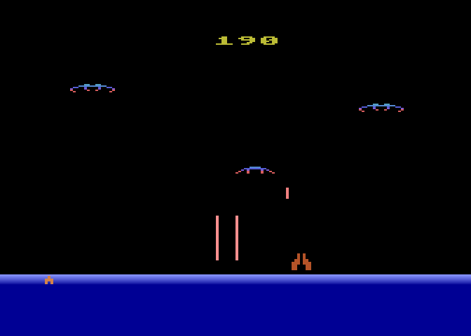 Demon Attack Atari 8-bit Screenshot: On this round the demons have lasers...