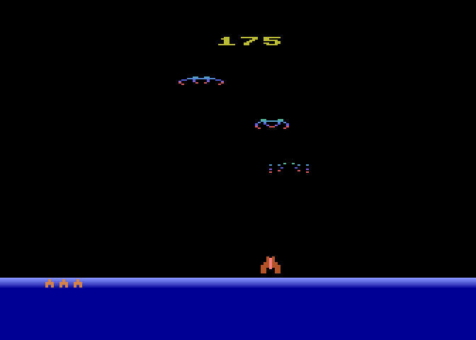 Demon Attack Atari 8-bit Screenshot: One demon destroyed, more to go...