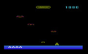 Demon Attack for Commodore VIC-20 - The solid yellow demon is trying to land...