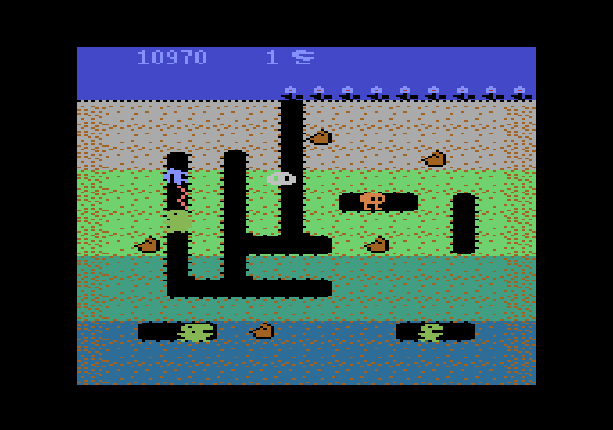 Dig Dug Atari 5200 Screenshot: Your opponents become faster and more aggressive as the game progresses.