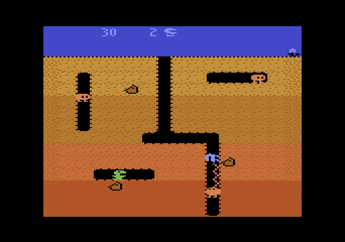 Dig Dug Atari 5200 Screenshot: Attacking a pooka.