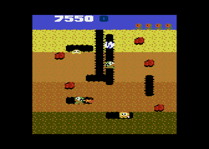 Dig Dug Atari 7800 Screenshot: The dragon looking things breathe fire, be careful!