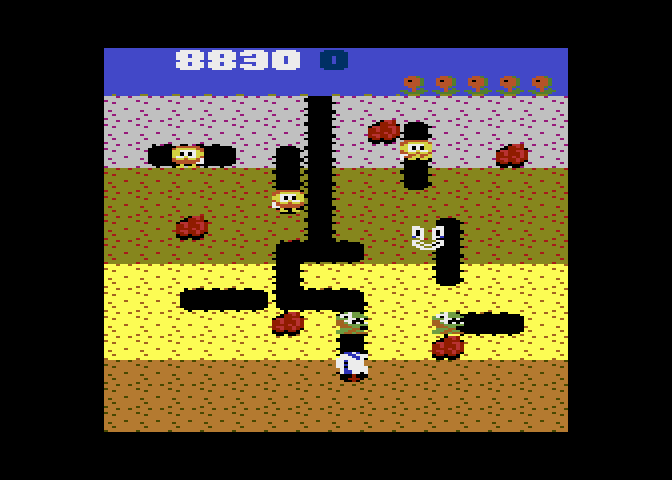 Dig Dug Atari 7800 Screenshot: Opponents can temporarily turn to ghosts to move through the dirt.