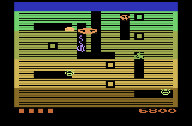Dig Dug Atari 2600 Screenshot: After a few rounds, your opponents increase in number and become more aggressive.