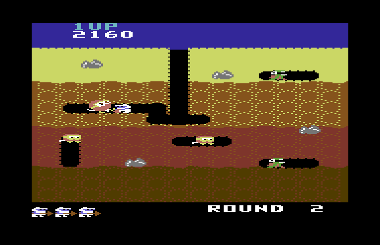 Dig Dug Commodore 64 Screenshot: Attacking an enemy...