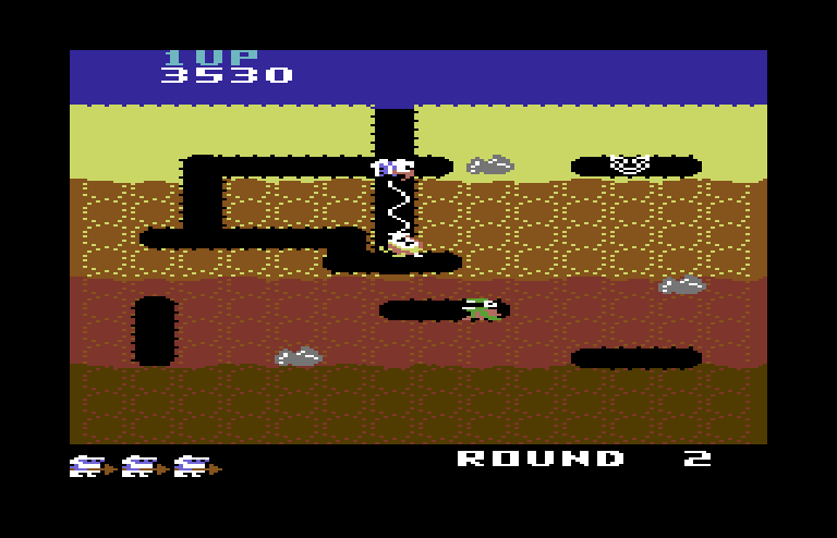 Dig Dug Commodore 64 Screenshot: You can use the air pump to attack vertically or horizontally...