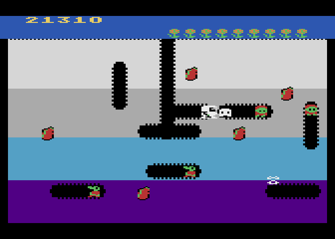 Dig Dug Atari 8-bit Screenshot: The flowers at the top indicate the level you are on.