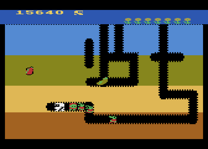Dig Dug Atari 8-bit Screenshot: Numerous opponents in pursuit!