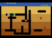 Dig Dug for Atari 8-bit - If you can, collect the item in the middle of the screen for bonus point.