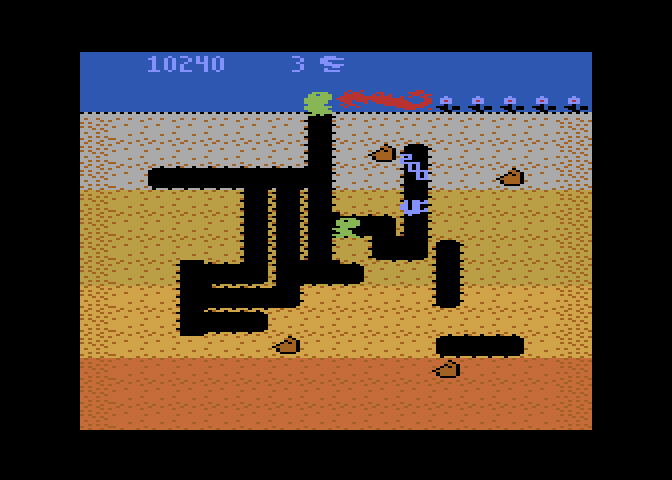 Dig Dug Atari 8-bit Screenshot: Be careful when near Fygars, they breathe fire!