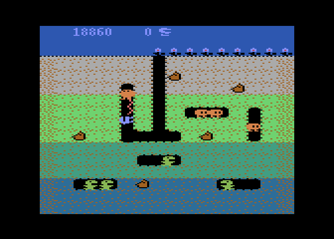Dig Dug Atari 8-bit Screenshot: Blasting an opponent...