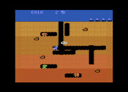 Dig Dug for Atari 8-bit - Opponents can change into ghosts to move through the dirt.