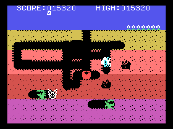 Dig Dug TI-99/4A Screenshot: Collect the item in the middle for bonus points.