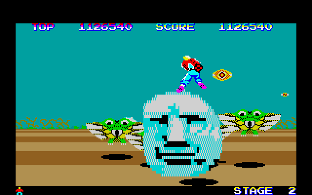 Space Harrier Fujitsu FM-7 Screenshot: Yikes, don't crash into these giant heads...