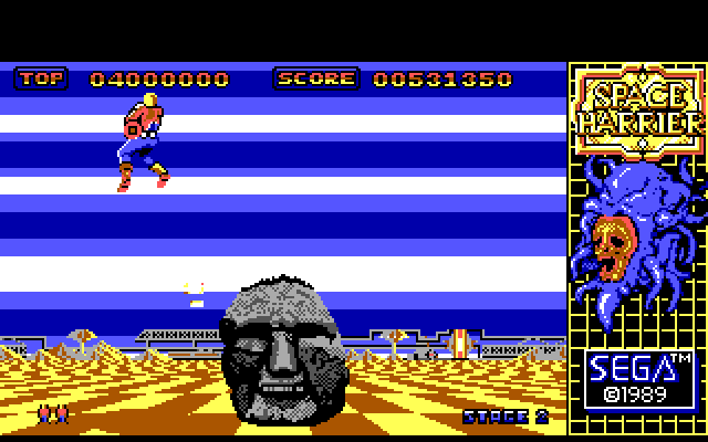 Space Harrier IBM PC/Compatibles Screenshot: Each level has different obstacles to avoid.