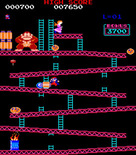 Donkey Kong for Arcade - Jump over barrels to reach the top.