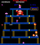 Donkey Kong for Arcade - Avoid those fireballs that chase you!