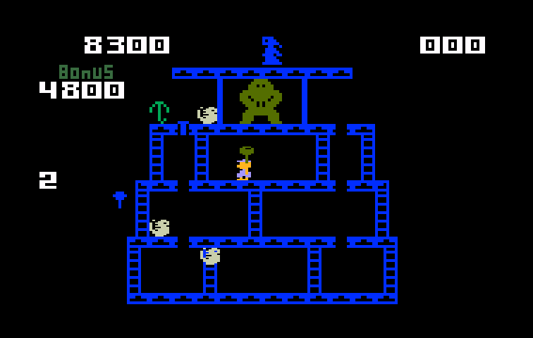 Donkey Kong Intellivision Screenshot: You can't climb ladders when holding the hammer.