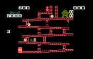 Donkey Kong for Intellivision - Use the hammer to smash barrels.